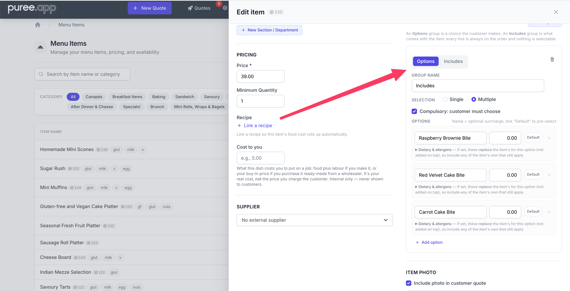 The Edit item panel open over the menu items list, with an arrow pointing to the Options / Includes toggle at the top of a group card. Below the toggle the group name reads 'Includes', with Multiple selection, Compulsory ticked, and three option rows, each with a price field and a Default pill